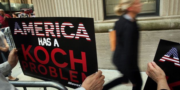 NEW YORK, NY - JUNE 05: Activists hold a protest near the Manhattan apartment of billionaire and Republican financier David Koch on June 5, 2014 in New York City. The demonstrators were protesting against the campaign contributions by the billionaire Koch brothers who are owners of Koch Industries Inc. The brothers have become a focus of Democrats and liberals as they are accused of skewing the political playing field with their finances. (Photo by Spencer Platt/Getty Images)