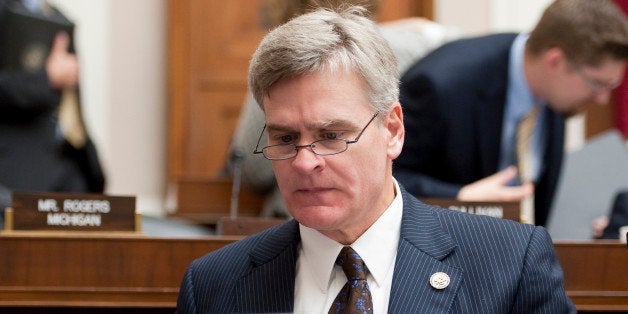 UNITED STATES â NOVEMBER 30: Rep. Bill Cassidy, R-La., works on his laptop during theHouse Energy and Commerce Committee ma