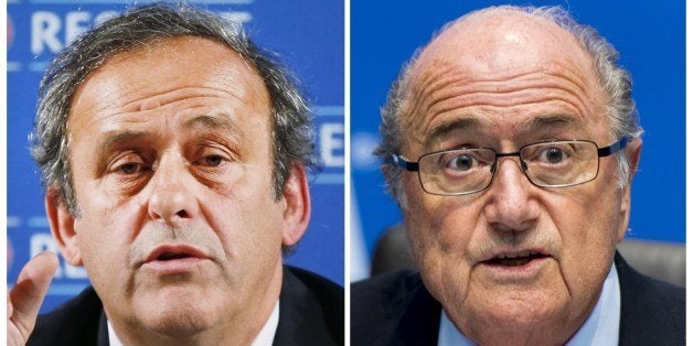 A combination made on June 3, 2014 shows files pictures of the UEFA president Michel Platini (L) taken on February 22, 2014 in Paris and the FIFA President Sepp Blatter taken on October 4, 2013 in Zurich. Michel Platini, president of European football's governing body, was on June 3, 2014 dragged into the FIFA corruption row after Britain's Daily Telegraph claimed he met secretly with the Qatari official at the heart of the claims. The Telegraph claims to have evidence that the UEFA chief held a private meeting with Mohamed Bin Hamman, a former FIFA vice president who the Sunday Times alleges paid more than $5 million to football officials around the world before the 2010 vote that awarded the tournament to Qatar. FIFA president Sepp Blatter refused to answer journalists' questions on new allegations of corruption. AFP PHOTO / VALERY HACHE / FABRICE COFFRINI (Photo credit should read VALERY HACHE,FABRICE COFFRINI/AFP/Getty Images)