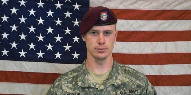 UNDATED - In this undated image provided by the U.S. Army, Sgt. Bowe Bergdahl poses in front of an American flag. U.S. officials say Bergdahl, the only American soldier held prisoner in Afghanistan, was exchanged for five Taliban commanders being held at Guantanamo Bay, Cuba, according to published reports. Bergdahl is in stable condition at a Berlin hospital, according to the reports. (Photo by U.S. Army via Getty Images)