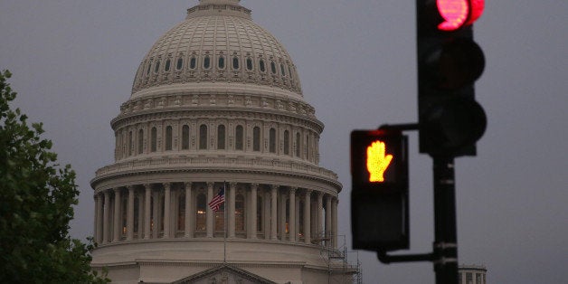 WASHINGTON, DC - JUNE 11: The U.S. Capitol is shown on the morning of June 11, 2014 in Washington, DC. Yesterday House Majority Leader Eric Cantor (R-VA) lost his Virginia primary to Tea Party challenger Dave Brat. (Photo by Mark Wilson/Getty Images)