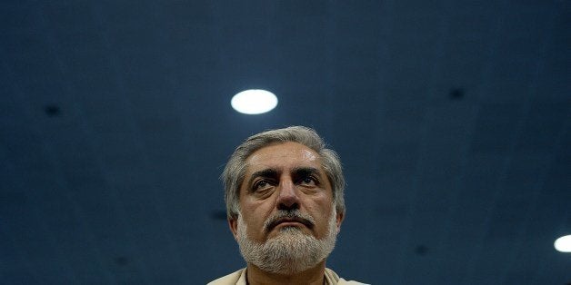 Afghan presidential candidate Abdullah Abdullah attends a gathering on the last day of campaigning in Kabul on June 11, 2014.