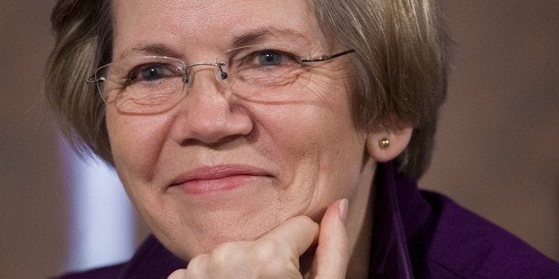 US Democratic Senator Elizabeth Warren of Massachusetts attends a Senate Banking, Housing and Urban Affairs Committee hearing on Capitol Hill, on February 27, 2014. AFP PHOTO / Saul LOEB (Photo credit should read SAUL LOEB/AFP/Getty Images)