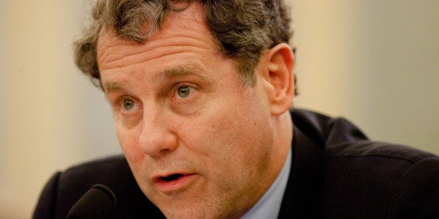 WASHINGTON - MARCH 30: Sen. Sherrod Brown (D-OH) testifies on Capitol Hill on March 30, 2011 in Washington, DC. The motorcoach safety hearing comes after recent bus accidents put a spotlight on oversight of buses and bus drivers. (Photo by Brendan Hoffman/Getty Images)