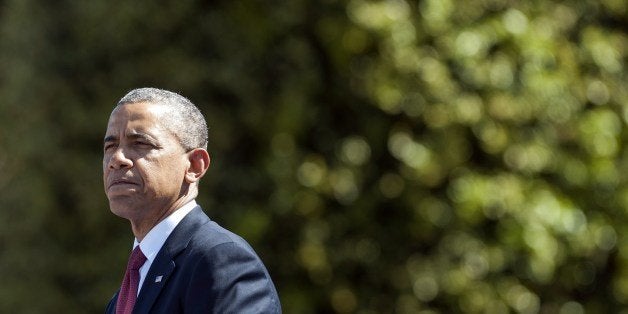 US President Barack Obama speaks during the 70th French-American Commemoration D-Day Ceremony at the Normandy American Cemetery and Memorial in Colleville-sur-Mer, Normandy, on June 6, 2014. Leaders and dignitaries from around the world traveled to attend events commemorating the June 6, 1944 Allied landings on the beaches of Normandy during World War II. AFP PHOTO / Saul LOEB (Photo credit should read SAUL LOEB/AFP/Getty Images)