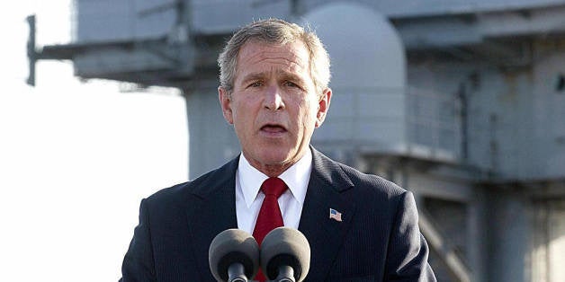 USS ABRAHAM LINCOLN, UNITED STATES: (FILES): This 01 May 2003 file photo shows US President George W. Bush addressing the nation on Iraq beneath a banner reading 'Mission Accomplished' aboard the nuclear aircraft carrier USS Abraham Lincoln as it sails for Naval Air Station North Island, San Diego, California. Three years after his famous photo-op before the banner, Bush on 01 May 2006 declared that the war-torn country had finally turned a corner in establishing security and democracy. AFP Photo/FILES/Stephen JAFFE (Photo credit should read STEPHEN JAFFE/AFP/Getty Images)