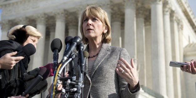 Massachusetts Attorney General Martha Coakley speaks to the media outside the US Supreme Court following oral arguments in th