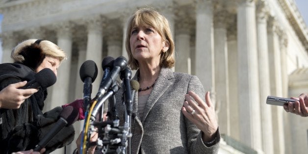 Massachusetts Attorney General Martha Coakley speaks to the media outside the US Supreme Court following oral arguments in the case of McCullen v. Coakley, dealing with a Massachusetts law imposing a 35-foot buffer zone around abortion clinics for demonstrations and protests, in Washington, DC, January 15, 2014. An anti-abortion protestor, Eleanor McCullen of Newton, Massachusetts, argues that the 2007 state law restricts her free speech rights under the First Amendment, while the state and Planned Parenthood argue they provide protection for individuals going to the clinics and provide a way to maintain public safety. AFP PHOTO / Saul LOEB (Photo credit should read SAUL LOEB/AFP/Getty Images)