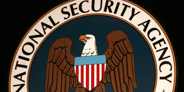 Fort Meade, UNITED STATES: (FILES): Thyis 25 January 2006 file photo shows the logo of the National Security Agency (NSA) at the Threat Operations Center inside the NSA in the Washington suburb of Fort Meade, Maryland, where US President George W. Bush delivered a speech behind closed doors and met with employees in advance of Senate hearings on the much-criticized domestic surveillance. The US National Security Agency has assembled the world's largest database of telephone records tracking the phone calls of tens of millions of AT and T, Verizon and BellSouth customers, sources familiar with the program told USA Today. In an article published 11 May 2006, the daily said the NSA launched the secret program in 2001, shortly after the 11 September 2001 attacks, to analyze calling patterns in a bid to detect terrorist activity. AFP PHOTO/FILES/Paul J. Richards (Photo credit should read PAUL J. RICHARDS/AFP/Getty Images)