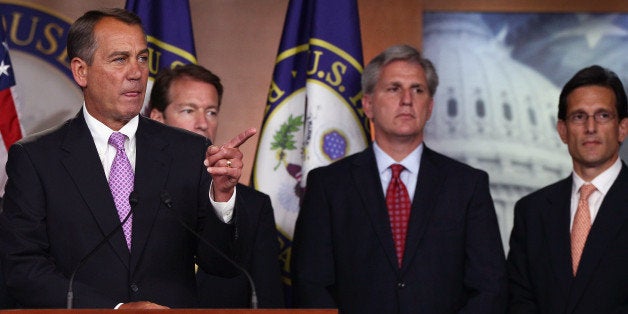 WASHINGTON, DC - JULY 14: U.S. House Speaker John Boehner (R-OH) (L) answers questions during a press conference on a balanced budget amendment with U.S. House Majority Leader Eric Cantor (R-VA) (R) at the U.S. Capitol July 14, 2011 in Washington, DC. Boehner and Cantor were also asked about their ongoing negotiations with the White House on debt ceiling talks during the press conference. Also pictured are U.S. Rep. Peter Roskam (R-IL) (2nd L) and U.S. House Majority Whip Rep. Kevin McCarthy (R-CA) (2nd R). (Photo by Win McNamee/Getty Images)