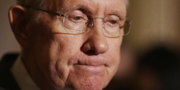 WASHINGTON, DC - MAY 20: Senate Majority Leader Harry Reid (D-NV) talks to reporters after the weekly Senate Democratic Policy Luncheon at the U.S. Capitol May 20, 2014 in Washington, DC. Reid defended the decision to premire a film critical of Charles and David Koch, 'Koch Brothers Exposed,' at the U.S. Capitol Visitors Center. (Photo by Chip Somodevilla/Getty Images)