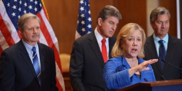 Senator Mary Landrieu (2nd R), D-LA, speaks during a a press conference on the Keystone XL pipeline in the Dirksen Senate Of