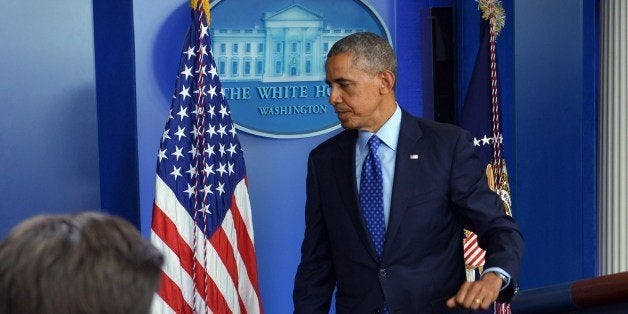 US President Barack Obama makes his way from the podium after speaking on the situation in Iraq on June 19, 2014 in the Brady