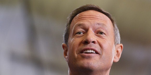 Maryland Governor Martin O'Malley introduces US President Barack Obama at Prince Georges Community College on September 26, 2013 in Largo, Maryland. AFP PHOTO/Mandel NGAN (Photo credit should read MANDEL NGAN/AFP/Getty Images)