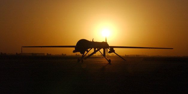 BALAD AIR FORCE BASE, IRAQ -SEPTEMBER 15: The RQ-1 Preditor taxi's in after one of its sorties September 15, 2004 in Balad Air Base, Iraq. The RQ-1is a medium-altitude, long-endurance unmanned aerial vehicle. (Photo by Rob Jensen/USAF via Getty Images)