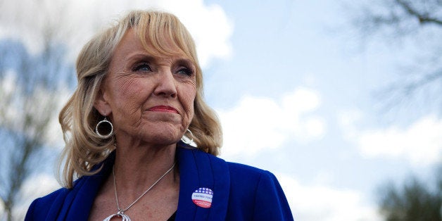 GLENDALE, AZ - FEBRUARY 28: Arizona Gov. Jan Brewer talks to the news media after voting in the Republican presidential primary February 28, 2012 in Glendale, Arizona. Arizona is a winner take all state, with all the delegates from the state going to the winner of the primary. Early voting began in the state February 2, with over 300, 000 votes already cast as of February 27. (Photo by Jonathan Gibby/Getty Images)