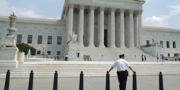 WASHINGTON, DC - MAY 27: The United States Supreme Court announced a ruling in the case Hall v. Florida, finding that the state had adopted too rigid a cutoff in deciding who is eligible to be spared the death penalty because of intellectual disabilities, May 27, 2014 in Washington, DC. There are 10 major case decisions yet to be announced by the Supreme Court, including a ruling in Sebelius v. Hobby Lobby Stores and Conestoga Wood Specialties v. Sebelius, and just five announcement days on the court's calendar. (Photo by Chip Somodevilla/Getty Images)