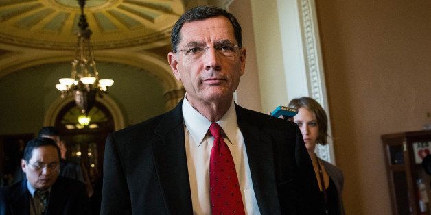WASHINGTON, DC - OCTOBER 14: Sen. John Barrasso (R-WY) walks through the Capitol Building on October 14, 2013 in Washington, DC. As Democratic and Republican leaders negotiate an end to the shutdown and a way to raise the debt limit, the White House postponed a planned Monday afternoon meeting with Boehner and other Congressional leaders. The government shutdown is currently in its 14th day. (Photo by Andrew Burton/Getty Images)