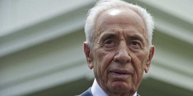 Israeli President Shimon Peres speaks to reporters outside of the West Wing after meeting with US President Barack Obama at the White House on June 25, 2014 in Washington, DC. AFP PHOTO/Mandel NGAN (Photo credit should read MANDEL NGAN/AFP/Getty Images)