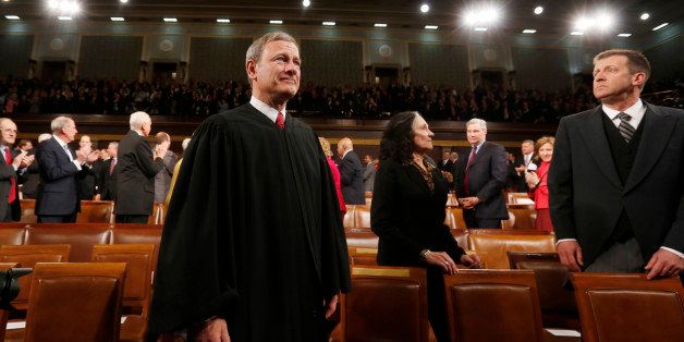 WASHINGTON, DC - JANUARY 28: U.S. Supreme Court Chief Justice John Roberts arrives prior to President Barack Obama's State of the Union speech on Capitol Hill on January 28, 2014 in Washington, DC. In his fifth State of the Union address, Obama is expected to emphasize on healthcare, economic fairness and new initiatives designed to stimulate the U.S. economy with bipartisan cooperation. (Photo by Larry Downing-Pool/Getty Images)