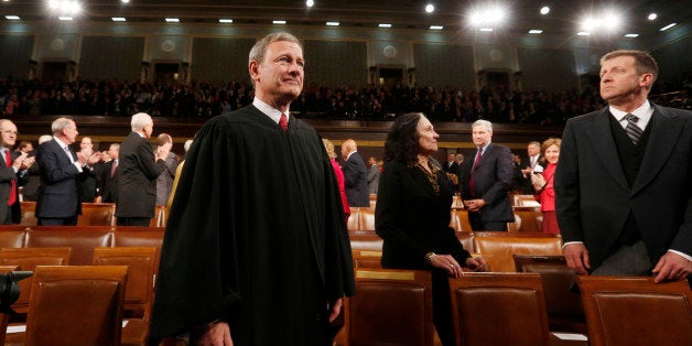 WASHINGTON, DC - JANUARY 28: U.S. Supreme Court Chief Justice John Roberts arrives prior to President Barack Obama's State of the Union speech on Capitol Hill on January 28, 2014 in Washington, DC. In his fifth State of the Union address, Obama is expected to emphasize on healthcare, economic fairness and new initiatives designed to stimulate the U.S. economy with bipartisan cooperation. (Photo by Larry Downing-Pool/Getty Images)