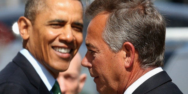 WASHINGTON, DC - MARCH 14: US President Barack Obama (L) talks with Speaker of the House John Boehner (R-OH) after a luncheon at the US Capitol, on March 14, 2014 in Washington, DC. Speaker Boehner hosted a lunch for Prime Minister Enda Kenny of Ireland in honor of St. Patricks Day on Sunday. (Photo by Mark Wilson/Getty Images)