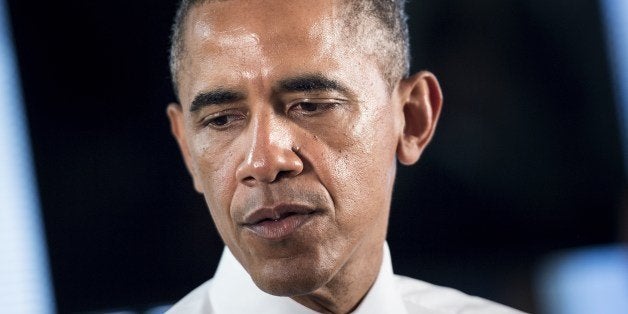 US President Barack Obama pauses while speaking to people at 1776, a tech startup hub, on July 3, 2014 in Washington, DC. Obama spoke about job growth as employers added 288,000 jobs in June, putting the unemployment rate to 6.1 percent, the lowest since September 2008, Labor Department data showed Thursday. AFP Photo/Brendan SMIALOWSKI (Photo credit should read BRENDAN SMIALOWSKI/AFP/Getty Images)