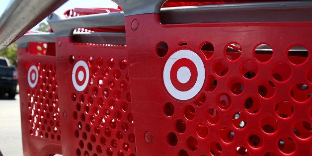 NOVATO, CA - MAY 22: Shopping carts sit in the parking lot of a Target store on May 22, 2013 in Novato, California. Target reported weaker than expected first quarter earnings with profits of $498 million, or 77 cents per share compared to $697 million, or $1.04 per share one year ago. (Photo by Justin Sullivan/Getty Images)