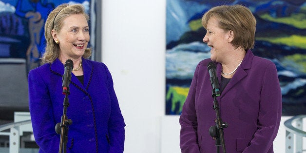 German Chancellor Angela Merkel speaks with US Secretary of State Hillary Clinton (L) prior to a meeting at the Federal Chancellery in Berlin, Germany, April 14, 2011. Clinton is in Berlin to attend the two-day NATO Foreign Ministers meetings. AFP PHOTO / POOL / Saul LOEB (Photo credit should read SAUL LOEB/AFP/Getty Images)