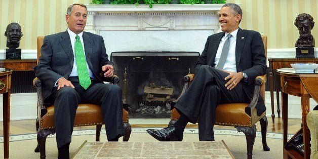 US President Barack Obama (R) meets Speaker John Boehner in the Oval Office at the White House in Washington, DC, on February