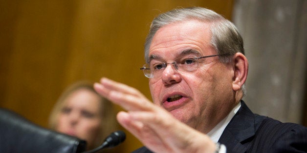 WASHINGTON, DC - APRIL 08:Committee chairman Sen. Bob Menendez (D-NJ) questions U.S. Secretary of State John Kerry during a S