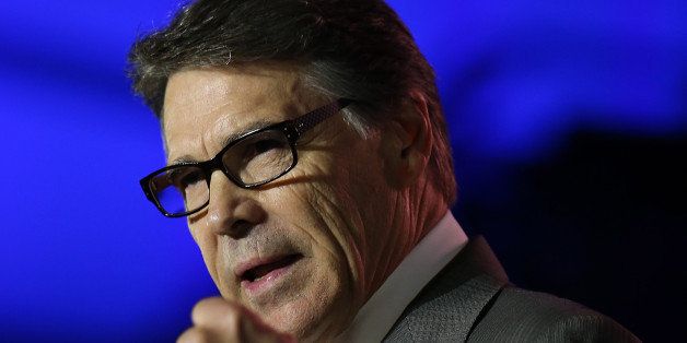 NEW ORLEANS, LA - MAY 31: Texas Gov. Rick Perry speaks during the final day of the 2014 Republican Leadership Conference on May 31, 2014 in New Orleans, Louisiana. Some of the biggest names in the Republican Party made appearances at the 2014 Republican Leadership Conference, which hosts 1,500 delegates from across the country through May 31. (Photo by Justin Sullivan/Getty Images)