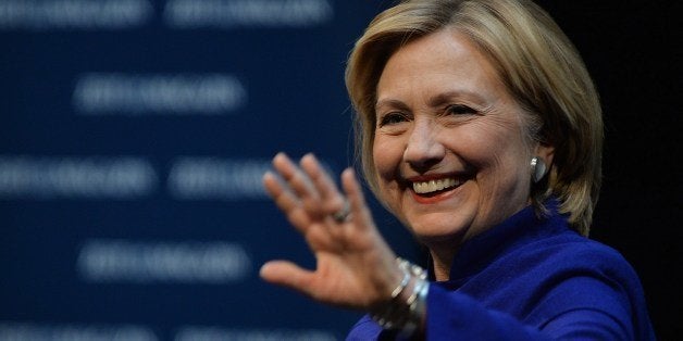 Former US Secretary of State Hillary Clinton gestures during a presentation of her new book at Schiller theatre on July 6, 2014 in Berlin, Germany. Clinton's book entitled 'Hard Choices' is reportedly only selling in small numbers. AFP PHOTO / OLIVER LANG (Photo credit should read OLIVER LANG/AFP/Getty Images)