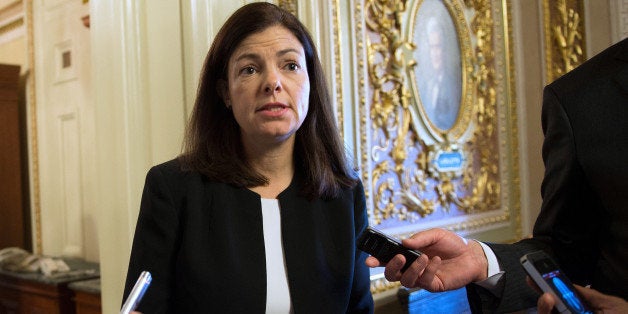 US Senator Kelly Ayotte, R-NH, walks to the weekly policy luncheon on Capitol Hill in Washington, DC, October 15, 2013. Washington's risky game of political brinkmanship neared crisis point Tuesday, with no deal yet nailed down to avoid a catastrophic US debt default, just 36 hours before a crucial deadline. Despite global fears that the US government could run out of money to pay its bills on Thursday, the rift cleaving US politics and a fight for the soul of the Republican Party thwarted compromise. Hopes a nascent deal between Republicans and Democrats in the Senate would open the way to resolve a fight over raising the US borrowing limit and reopening government proved over optimistic. AFP PHOTO / Jim WATSON (Photo credit should read JIM WATSON/AFP/Getty Images)