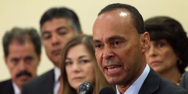 WASHINGTON, DC - JULY 11: U.S. Rep. Luis Gutierrez (D-IL), (4th L) speaks as (L-R) Rep. JosÃ© Serrano (D-NY), Rep. Tony Cardenas (D-CA), Rep. Loretta Sanchez (D-CA), and Rep. Lucille Roybal-Allard (D-CA) listen during a news conference July 11, 2014 on Capitol Hill in Washington, DC. The Congressional Hispanic Caucus' Immigration Task Force held a news conference to discuss unaccompanied minors crossing the U.S. border. (Photo by Alex Wong/Getty Images)