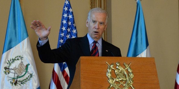 US Vice-President Joe Biden speaks during a joint press conference with Guatemalan President Otto Perez Molina (out of frame) at the Culture Palace in Guatemala City on June 20, 2014. AFP PHOTO Johan ORDONEZ (Photo credit should read JOHAN ORDONEZ/AFP/Getty Images)