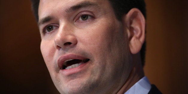 WASHINGTON, DC - MAY 13: U.S. Sen. Marco Rubio (R-FL) speaks during a National Press Club Newsmaker Luncheon May 13, 2014 in Washington, DC. Sen. Rubio delivered a policy speech on social security and answered questions during the luncheon. (Photo by Alex Wong/Getty Images)