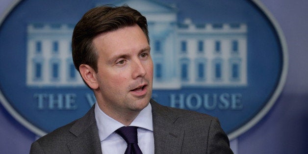 WASHINGTON, DC - JULY 11: White House Press Secretary Josh Earnest answers reporters' questions during the daily news briefing in the Brady Press Briefing Room at the White House July 11, 2014 in Washington, DC. Earnest said the White House is ready to work with Congress to pass emergency spending to address the surge of undocumented children who have crossed the U.S.-Mexico border. (Photo by Chip Somodevilla/Getty Images)