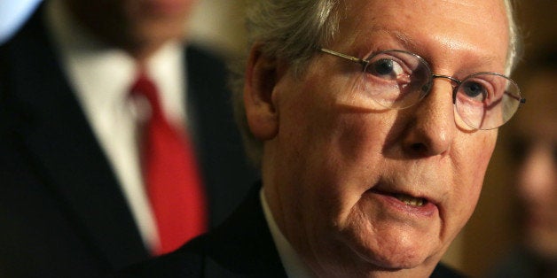 WASHINGTON, DC - MARCH 05: U.S. Senate Minority Leader Sen. Mitch McConnell (R-KY) speaks during a news briefing March 5, 2014 on Capitol Hill in Washington, DC. Senate GOP leaders spoke to members of the media after their weekly policy luncheon. (Photo by Alex Wong/Getty Images)