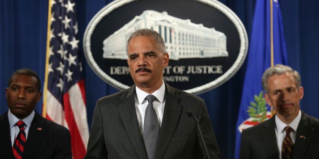 WASHINGTON, DC - JULY 14: (L-R) U.S. Associate Attorney General Tony West (2nd L), U.S. Attorney General Eric Holder, and U.S. Attorney for the District of Colorado John Walsh listen during a news conference for a major financial fraud announcement at the Justice Department July 14, 2014 in Washington, DC. Citigroup has agreed to pay the government $7 billion in fines for its misleading investors about some of the mortgage-backed securities sold prior to January 1, 2009. (Photo by Alex Wong/Getty Images)