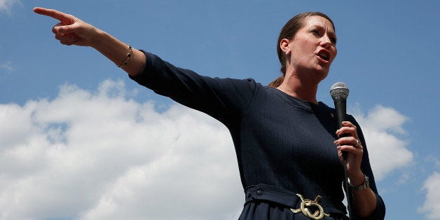 COVINGTON, KY - MAY 18: U.S. Senate candidate and Kentucky Secretary of State Alison Lundergan Grimes (D-KY) campaigns in advance of the state's Democratic primary May 18, 2014 at the Maifest festival in Covington, Kentucky. A recent 'Bluegrass Poll' by the Louisville Courier-Journal showed Grimes in a virtual tie with the incumbent, Senate Republican Leader Mitch McConnell (R-KY). (Photo by Win McNamee/Getty Images)