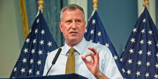 NEW YORK, NY - JULY 03: New York City Mayor Bill De Blasio addresses recent weather reports and the approaching Hurricane Arthur at City Hall on July 3, 2014 in New York City. Current reports state that Hurricane Arthur is strengthening over the Atlantic, with forecasters predicting that it will become a strong Category 2 storm. In addition, Bill De Blasio also hosted the Nathan's hot dog eating contest weigh in ceremony. (Photo by Andrew Burton/Getty Images)