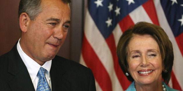 WASHINGTON, DC - JULY 11: House Minority Leader Nancy Pelosi (D-CA) (R) and House Speaker John Boehner (R-OH) await to sign bipartisan legislation Workforce Innovation and Opportunity Act. at the U.S. Capitol, July 11, 2014 in Washington, DC. Also pictured are Ranking Member of the House Education & Workforce Committee George Miller (D-CA) (2ndL), Chairman of the House Education & Workforce Committee John Kline (R-MN) (3rdL), Rep. Virginia Foxx (R-NC)(2nd-R) and Rep. Ruben Hinojosa (D-TX) (R). (Photo by Mark Wilson/Getty Images)