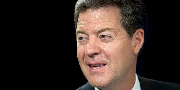 Sam Brownback, governor of Kansas, speaks during a Bloomberg Television interview inside the Bloomberg Link during the Republican National Convention in Tampa, Florida, U.S., on Tuesday Aug. 28, 2012. Mitt Romney secured enough delegates to officially win the Republican presidential nomination at the party's convention in Tampa. Photographer: David Paul Morris/Bloomberg via Getty Images
