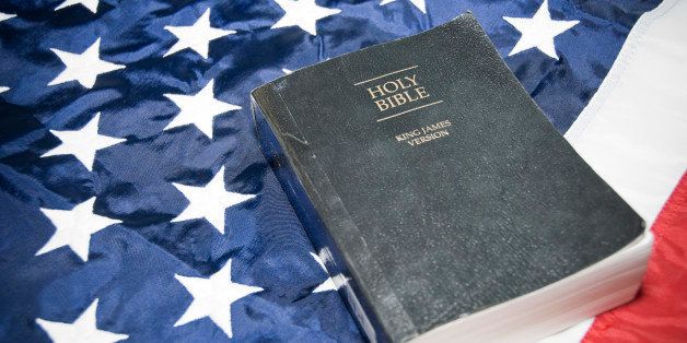 Close-up of holy bible on flag of America.