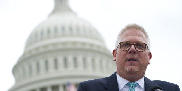 Conservative radio and television commentator Glenn Beck speaks to a rally of Tea Party members as they protest against the Internal Revenue Service (IRS) targeting of the Tea Party and similar groups during a rally called 'Audit the IRS' outside the US Capitol in Washington, DC, June 19, 2013. AFP PHOTO / Saul LOEB (Photo credit should read SAUL LOEB/AFP/Getty Images)