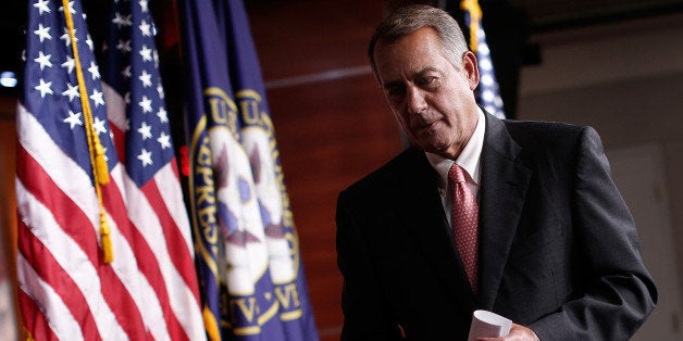 WASHINGTON, DC - JULY 17: U.S. Speaker of the House John Boehner (R-OH) departs his weekly press conference July 17, 2014 in