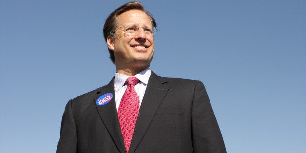 GLEN ALLEN, VA - APRIL 26: College economics professor and Republican candidate for Congress David Brat (C) poses for a phot