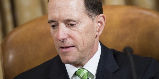 Committee chairman Rep. Dave Camp (R-MI) speaks during a markup session of the House Ways and Means Committee on Capitol Hill July 10, 2014 in Washington, DC. The committee marked up House Resolution 645 which requests White House emails to former Internal Revenue Service official Lois Lerner from 2009 to 2011. AFP PHOTO/Brendan SMIALOWSKI (Photo credit should read BRENDAN SMIALOWSKI/AFP/Getty Images)