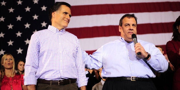 Republican presidential hopeful Mitt Romney receives the endorsement of New Jersey Governor Chris Christie (R) during a rally venue in Exeter, New Hampshire, January 8, 2012. New Hampshire will hold its Republican primaries on January 10, 2012. AFP PHOTO/Emmanuel Dunand (Photo credit should read EMMANUEL DUNAND/AFP/Getty Images)